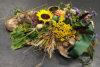 rouwwerk op hout schijven met zonnebloemen